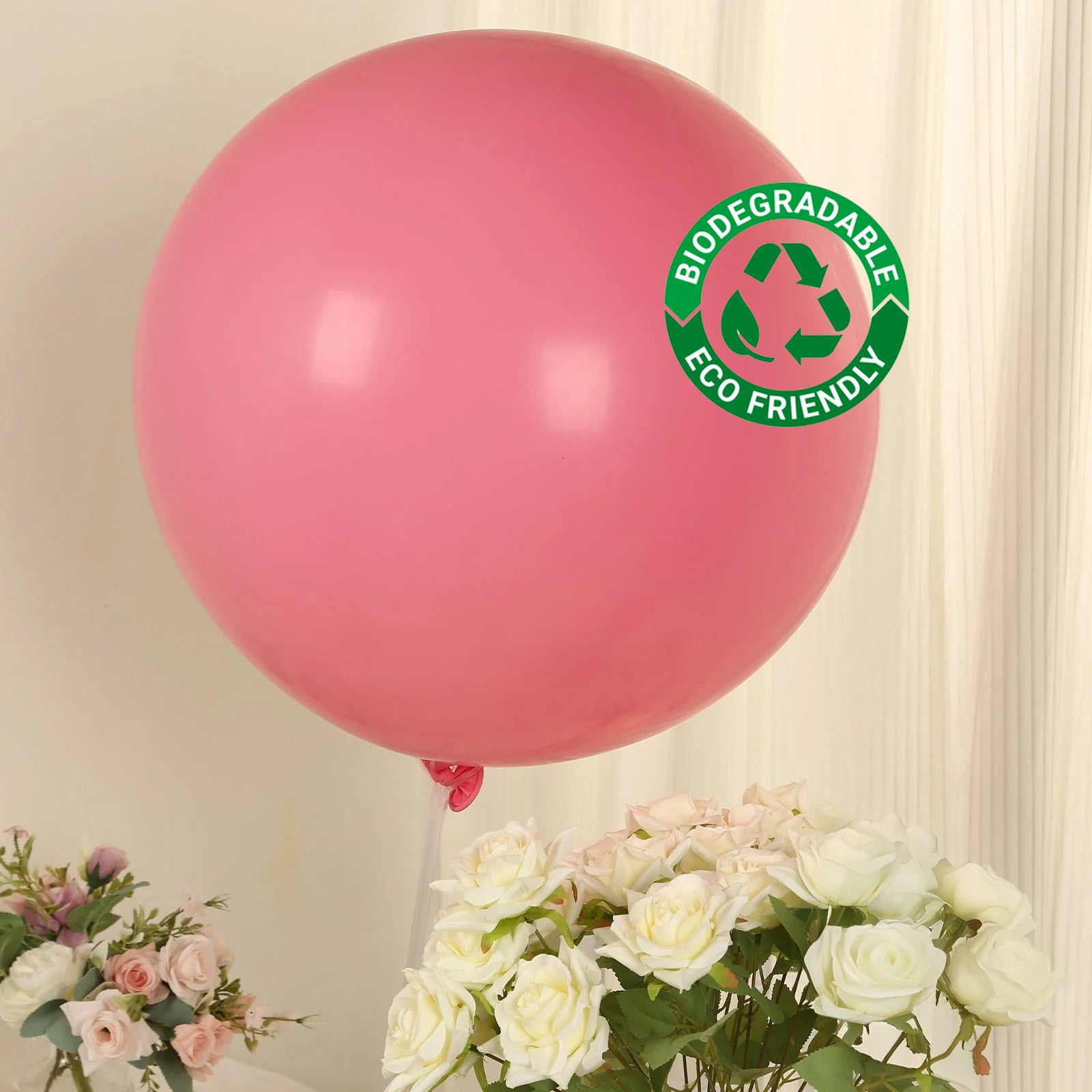 Large matte pastel pink biodegradable balloon, eco-friendly party decoration.
