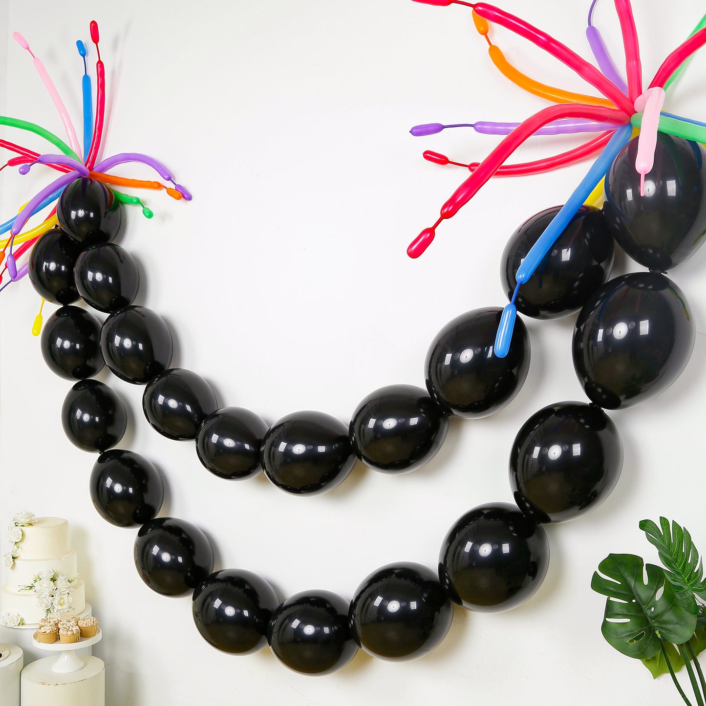Matte pastel black biodegradable linking balloons for decor.