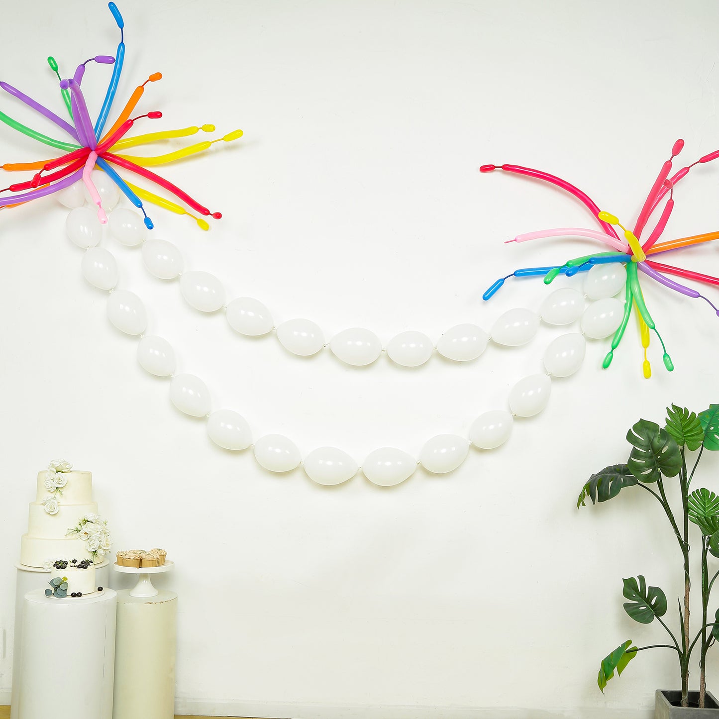 Matte pastel white biodegradable link balloons for decor and garlands.