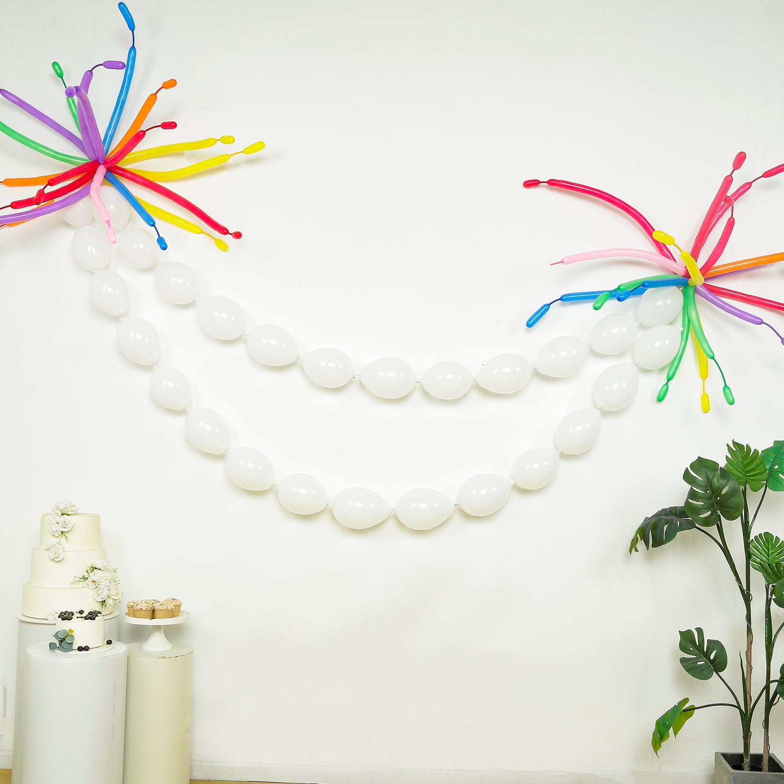 Matte pastel white biodegradable link balloons for decor and garlands.