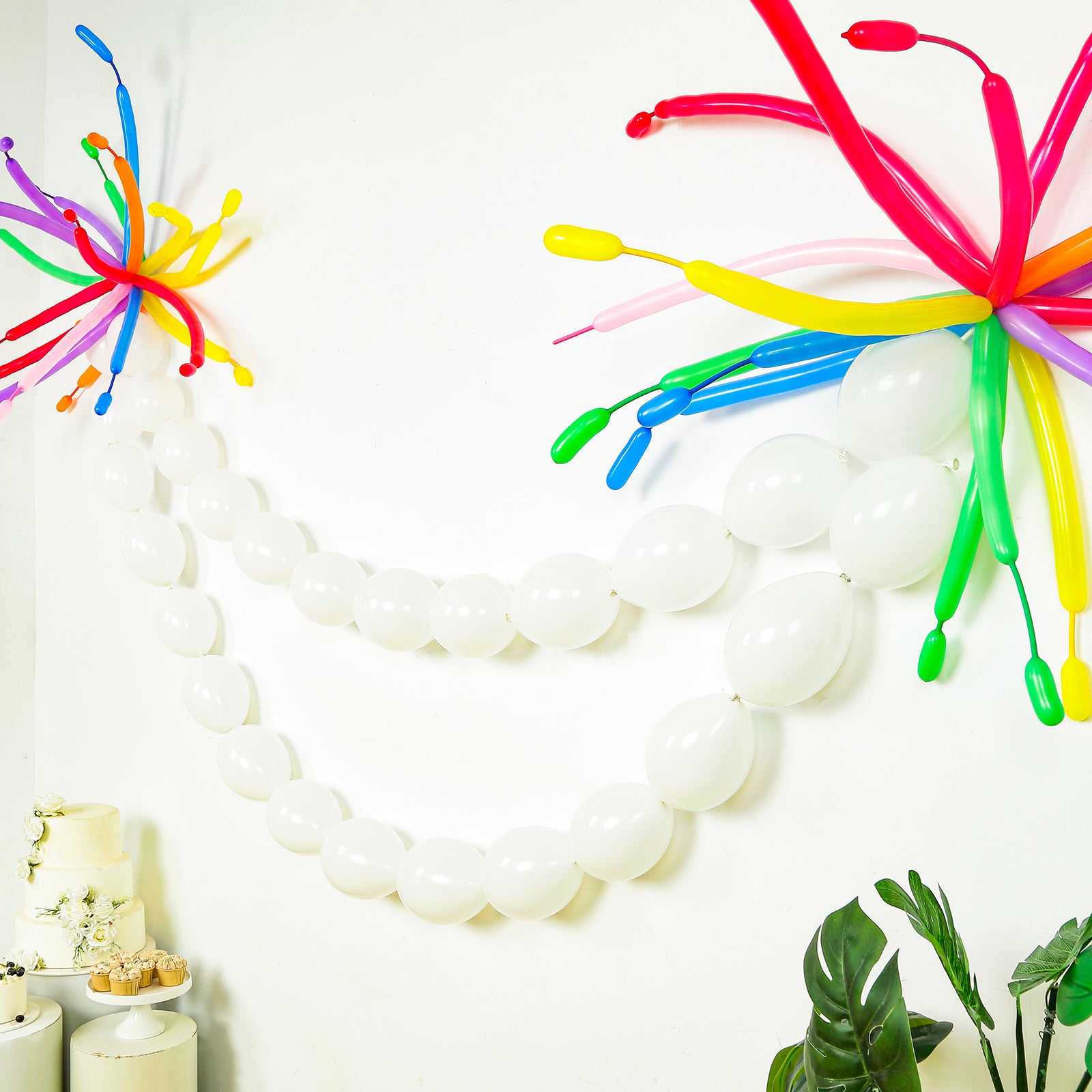 Matte pastel white biodegradable link balloons for decor and garlands.