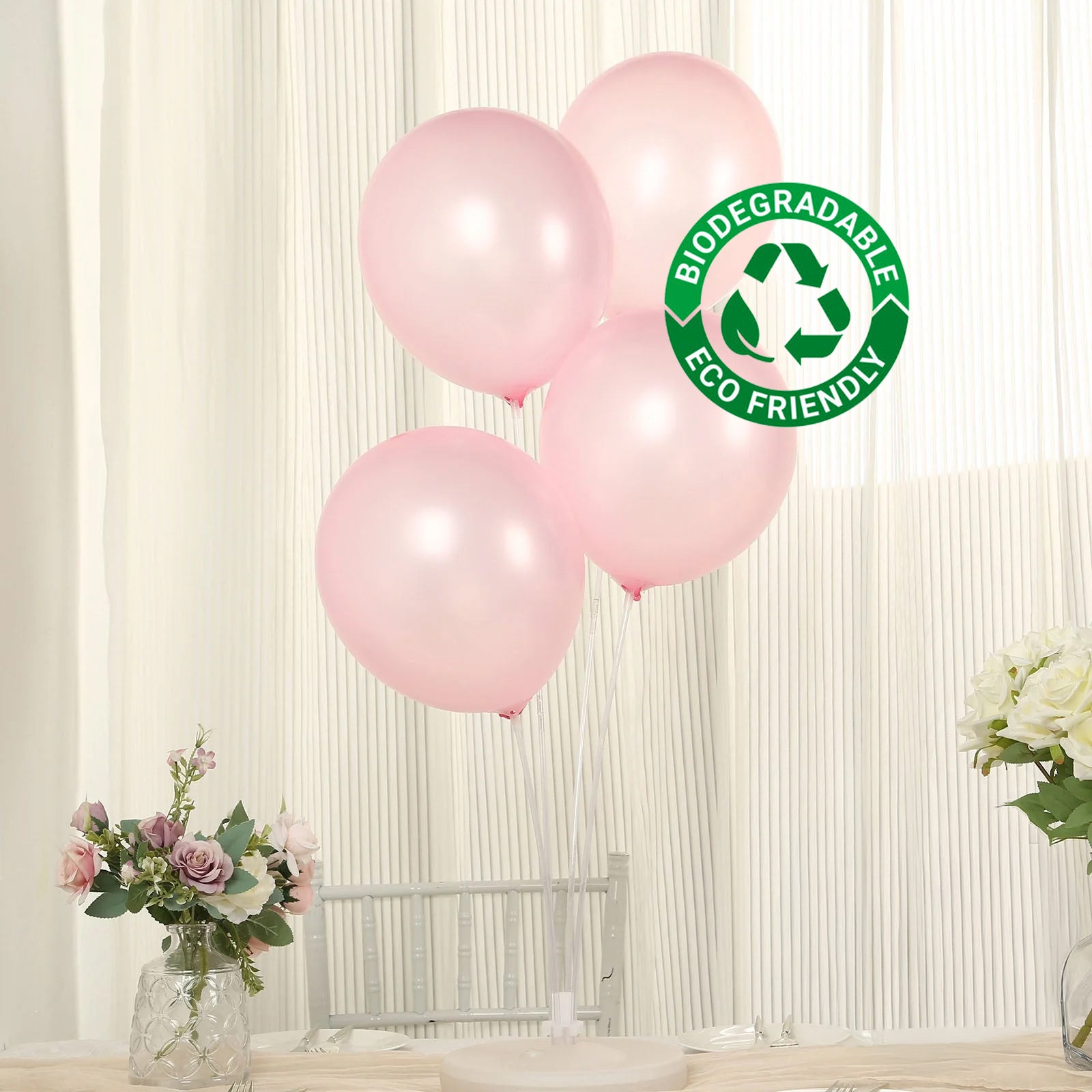 Blush biodegradable balloons for eco-friendly party decor.