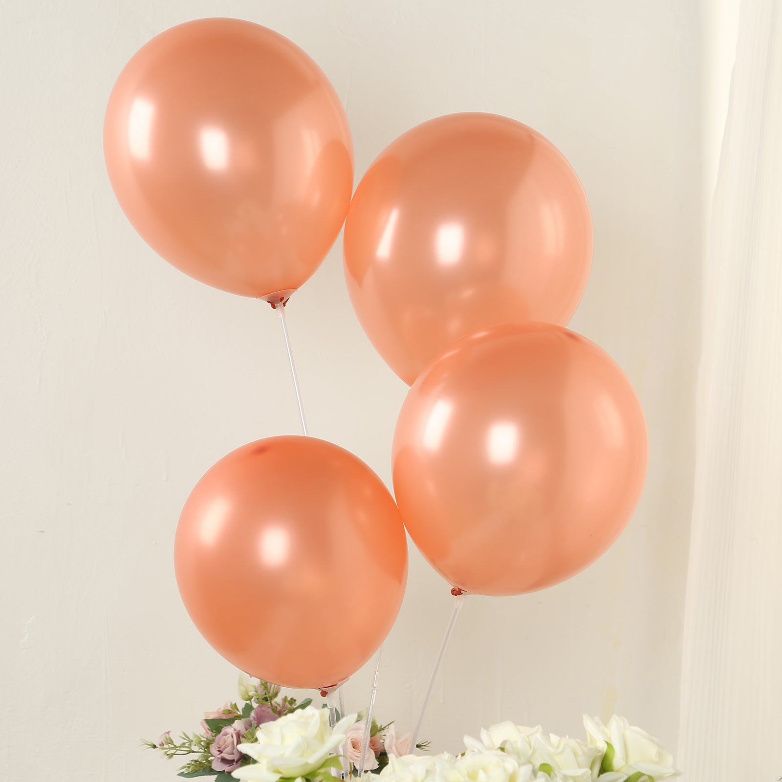 Rose gold biodegradable balloons for eco-friendly celebrations.