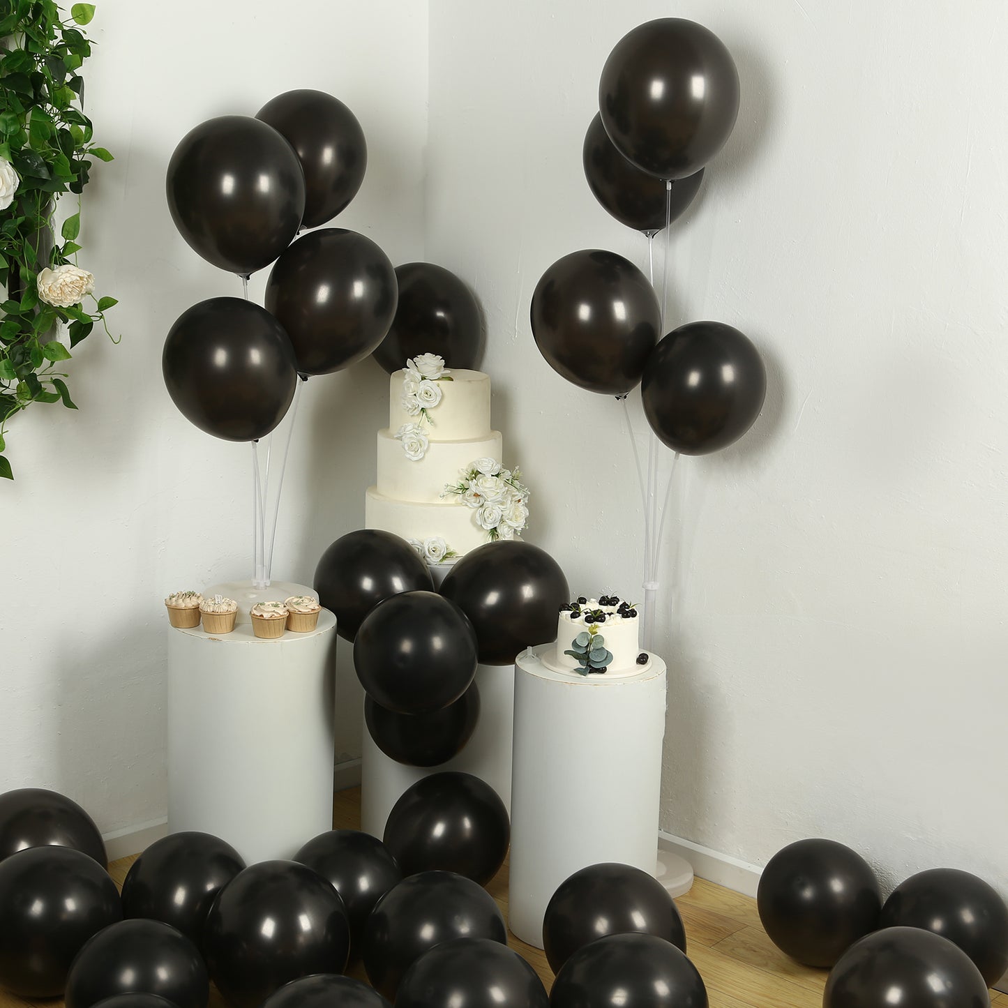 Black biodegradable balloons for eco-friendly party decor.
