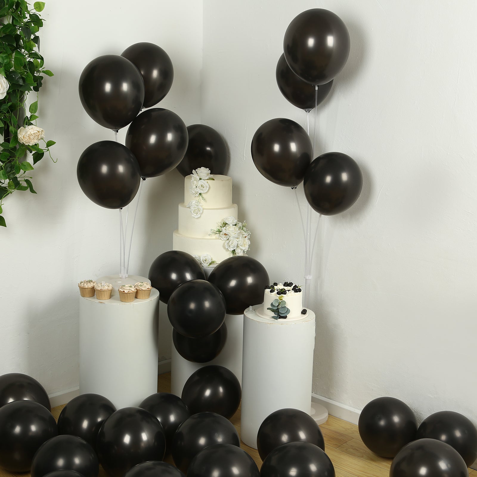 Black biodegradable balloons for eco-friendly party decor.