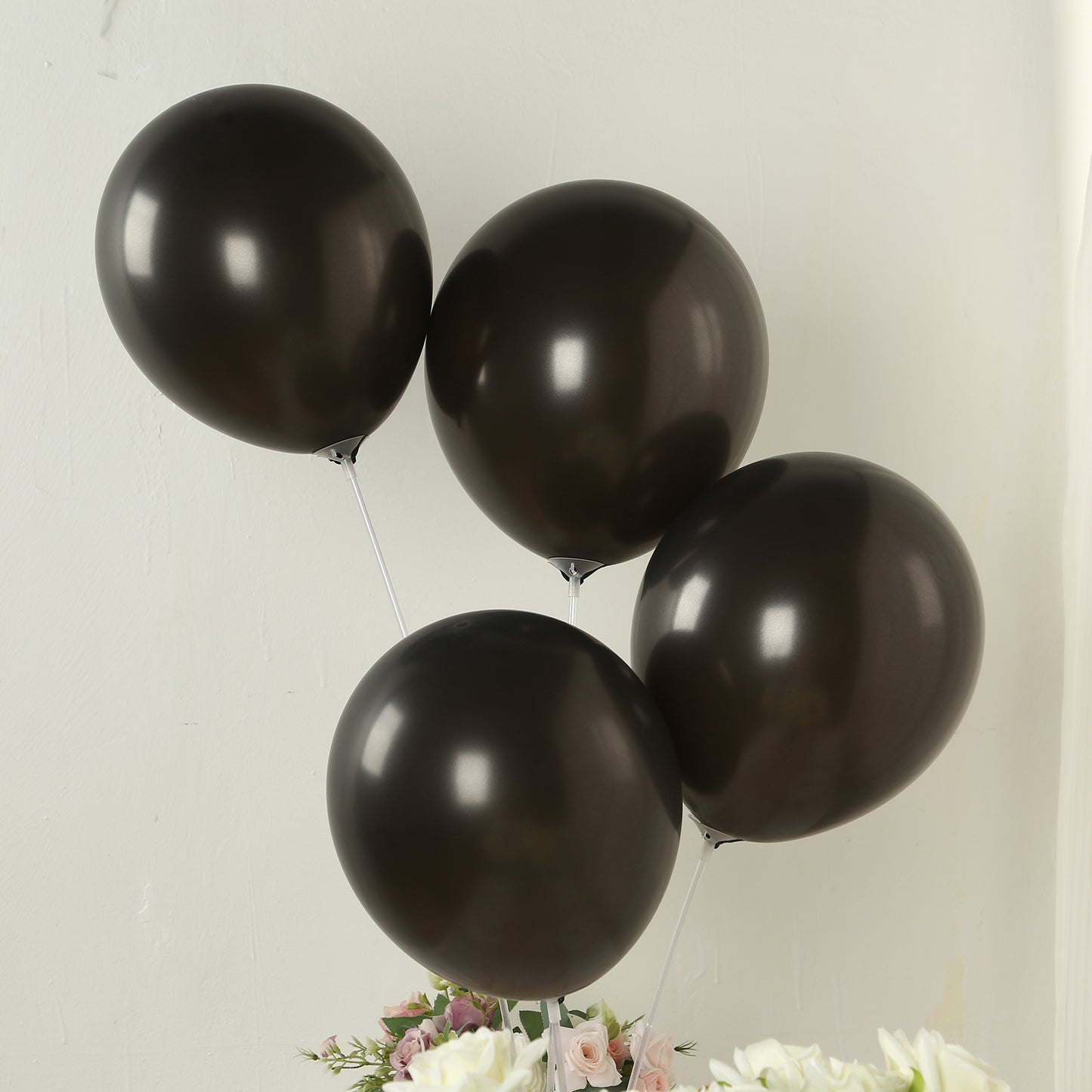 Black biodegradable balloons for eco-friendly parties.