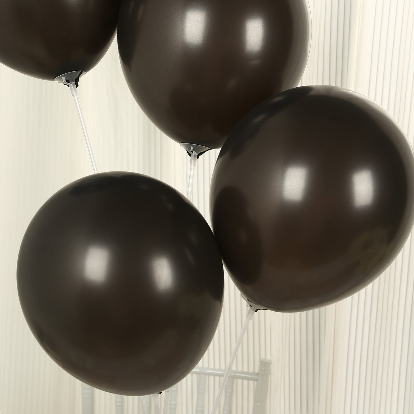 Black biodegradable balloons in a 50-pack.