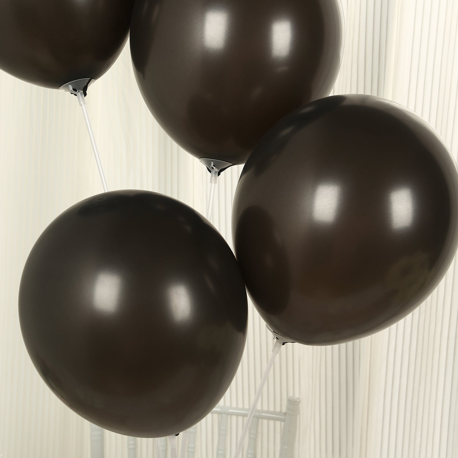 Black biodegradable balloons in a 50-pack.