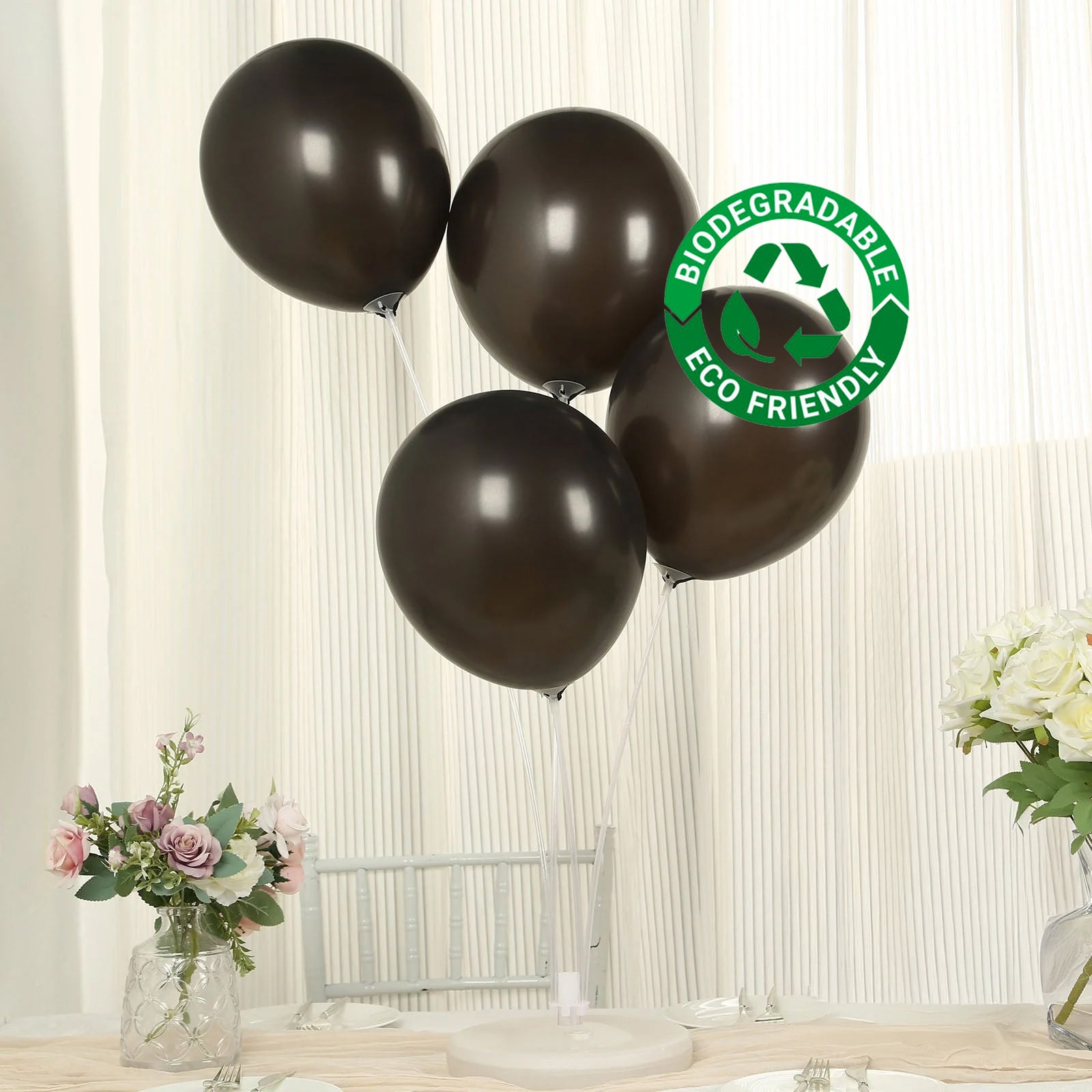 Black biodegradable balloons for eco-friendly party decorations.