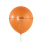 Orange biodegradable 12" balloon, eco-friendly and strong for parties.