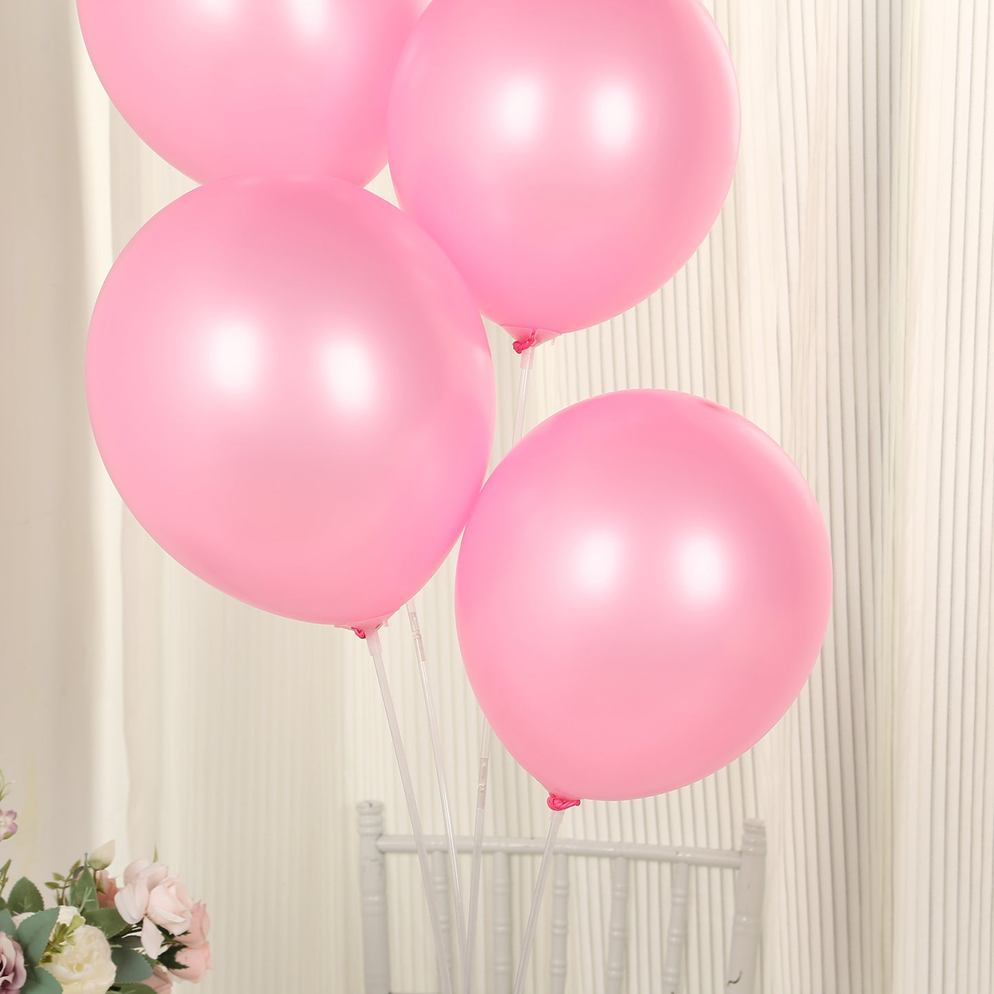 Pink biodegradable balloons for eco-friendly parties.