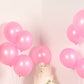 Pink biodegradable balloons for eco-friendly party decor.