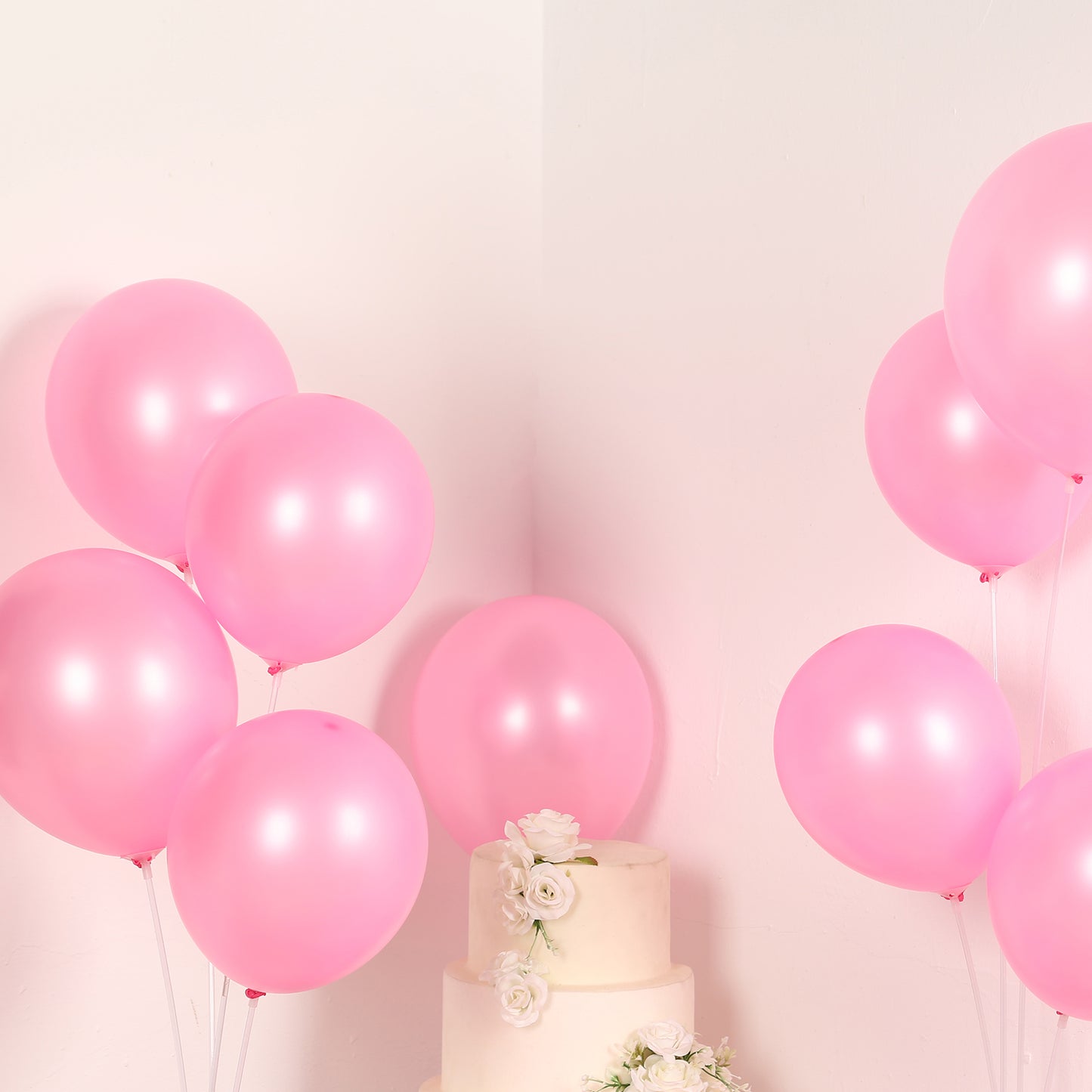 Pink biodegradable balloons for eco-friendly party decor.
