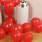 Red biodegradable balloons for eco-friendly celebrations.