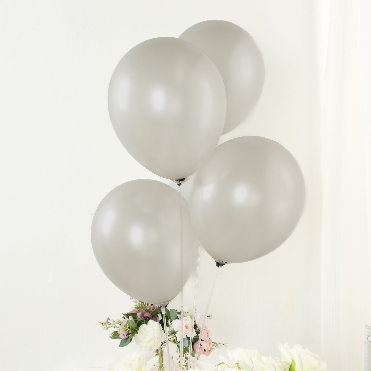 Silver biodegradable balloons for eco-friendly parties.