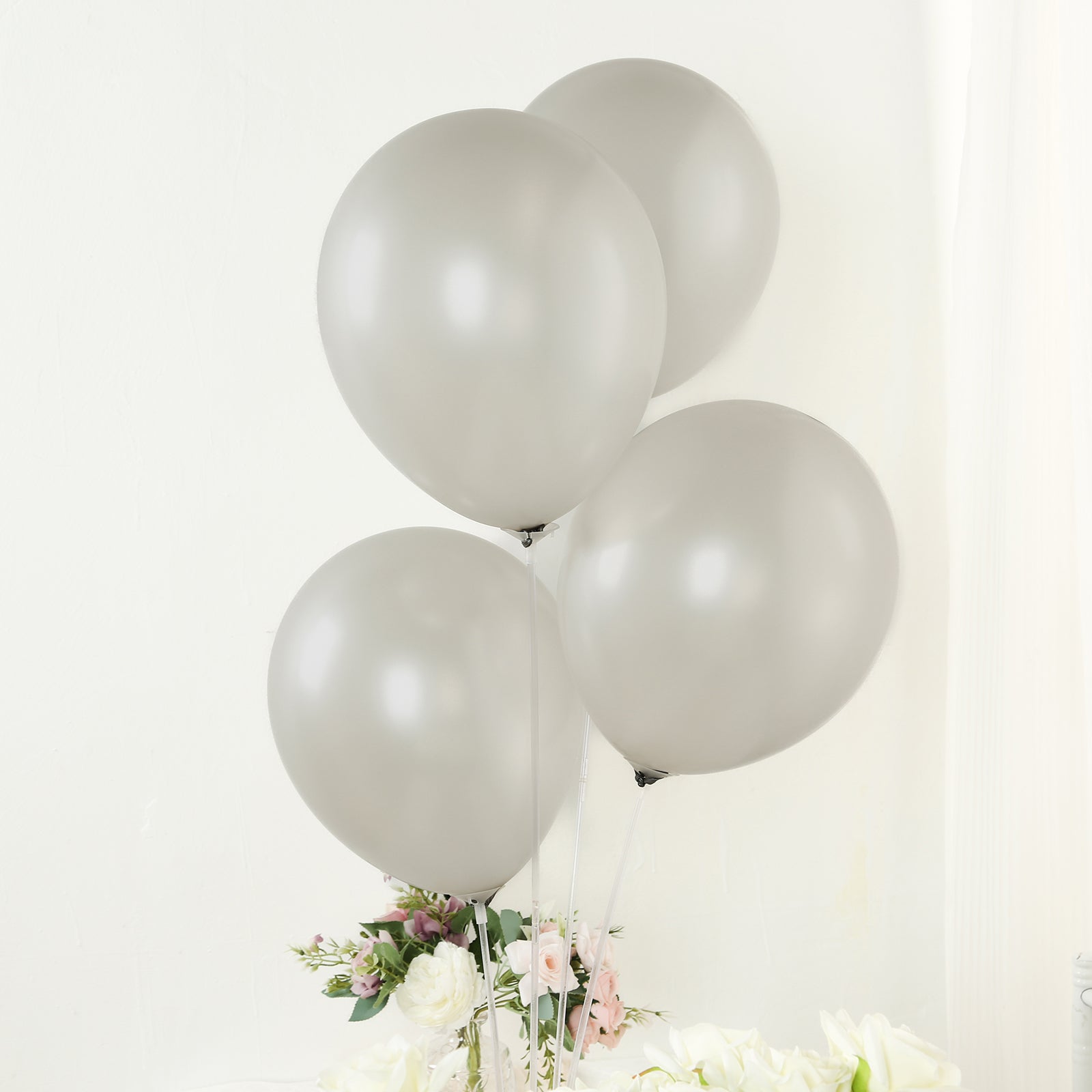 Silver biodegradable balloons for eco-friendly parties.