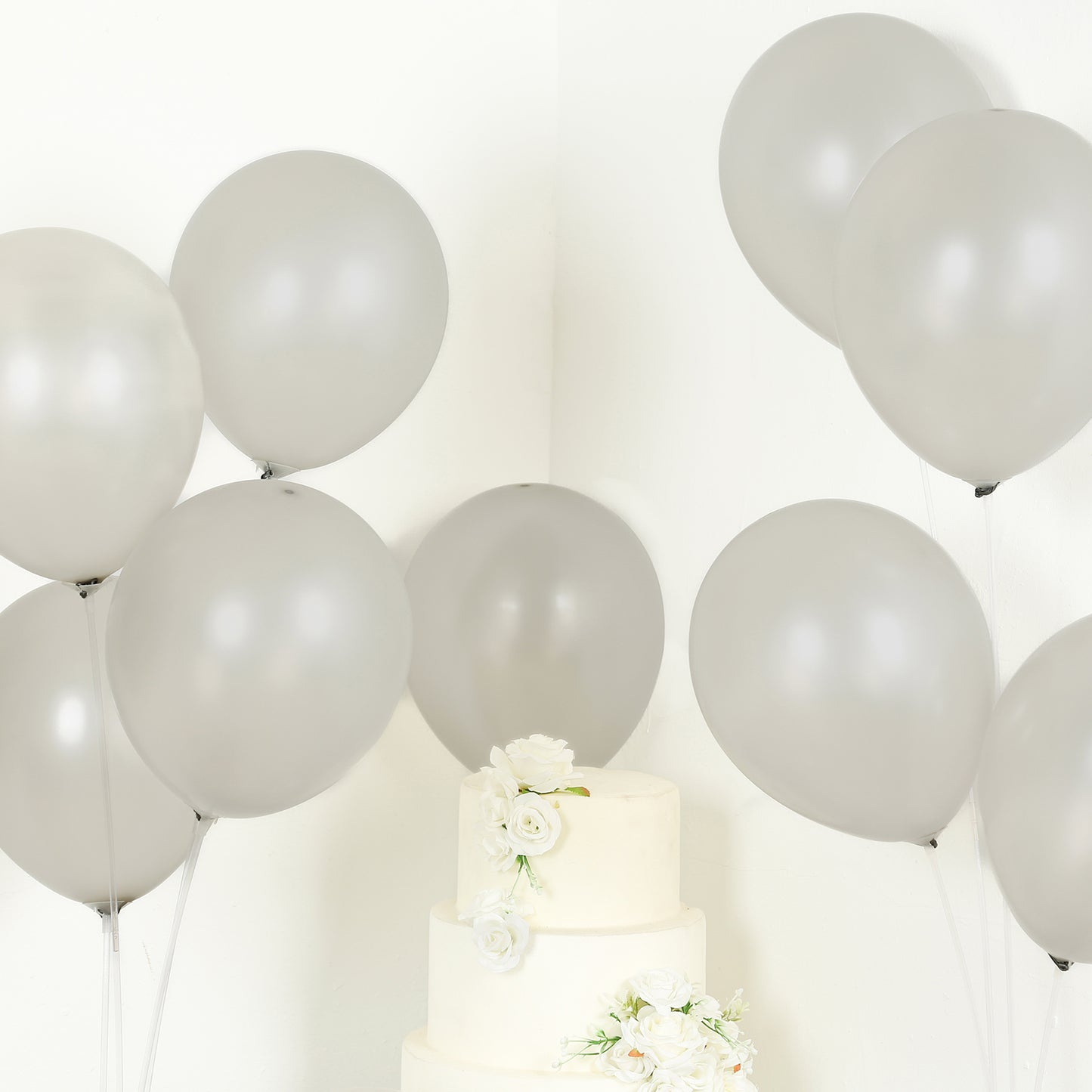 Silver biodegradable balloons for eco-friendly party decorations.