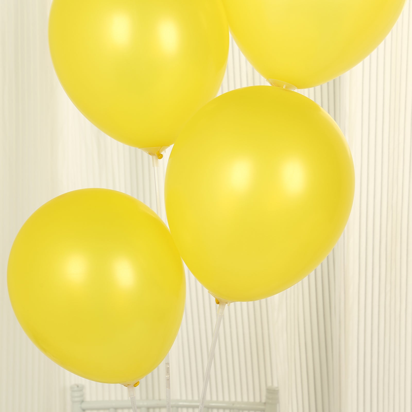 Yellow biodegradable balloons for eco-friendly celebrations.