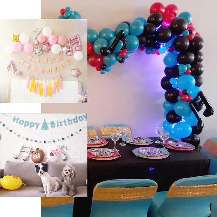 Rose gold music note mylar foil balloons in festive party decor.
