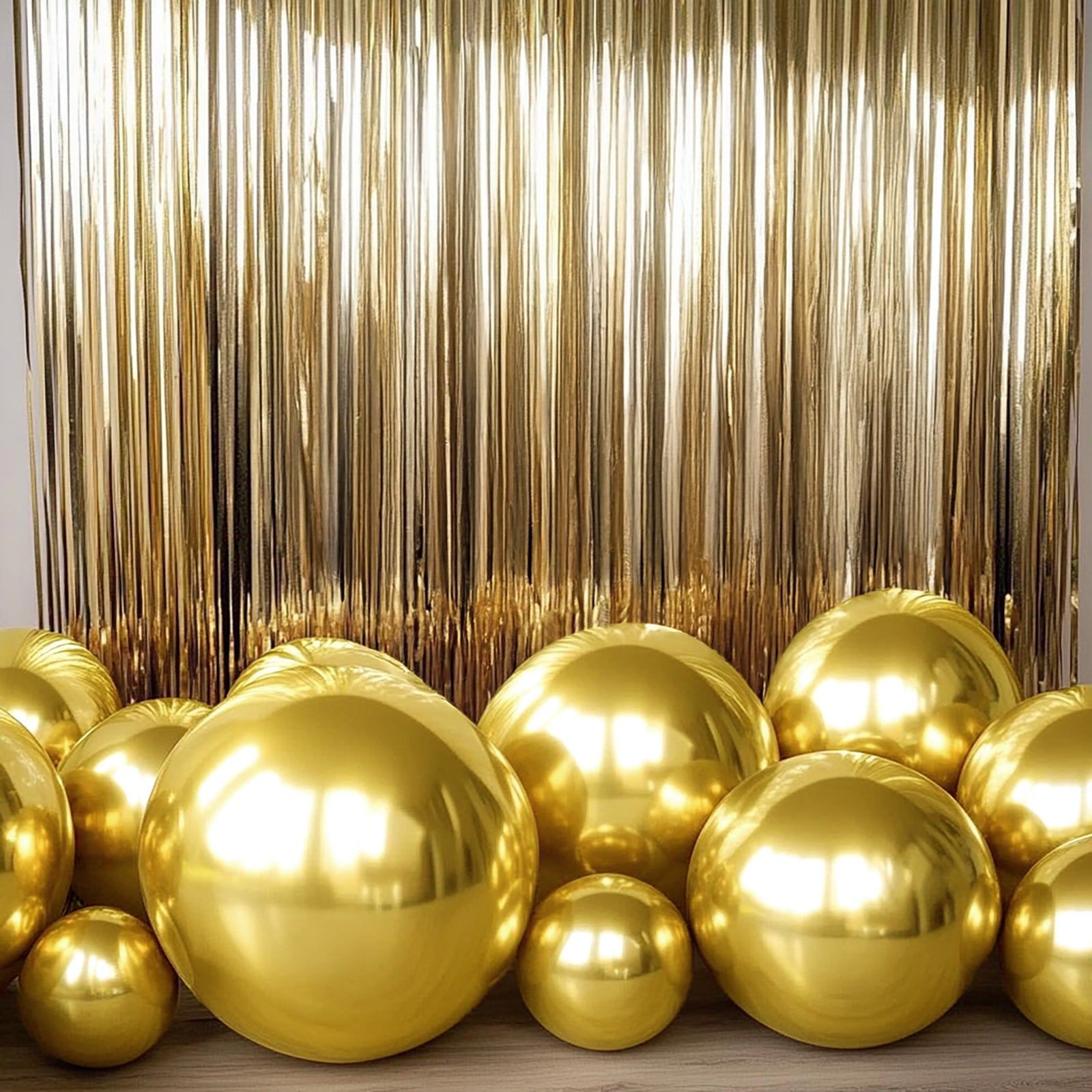 Metallic gold sphere balloons for parties, helium or air-filled.