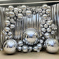 32" metallic silver sphere balloons arranged in a decorative display.