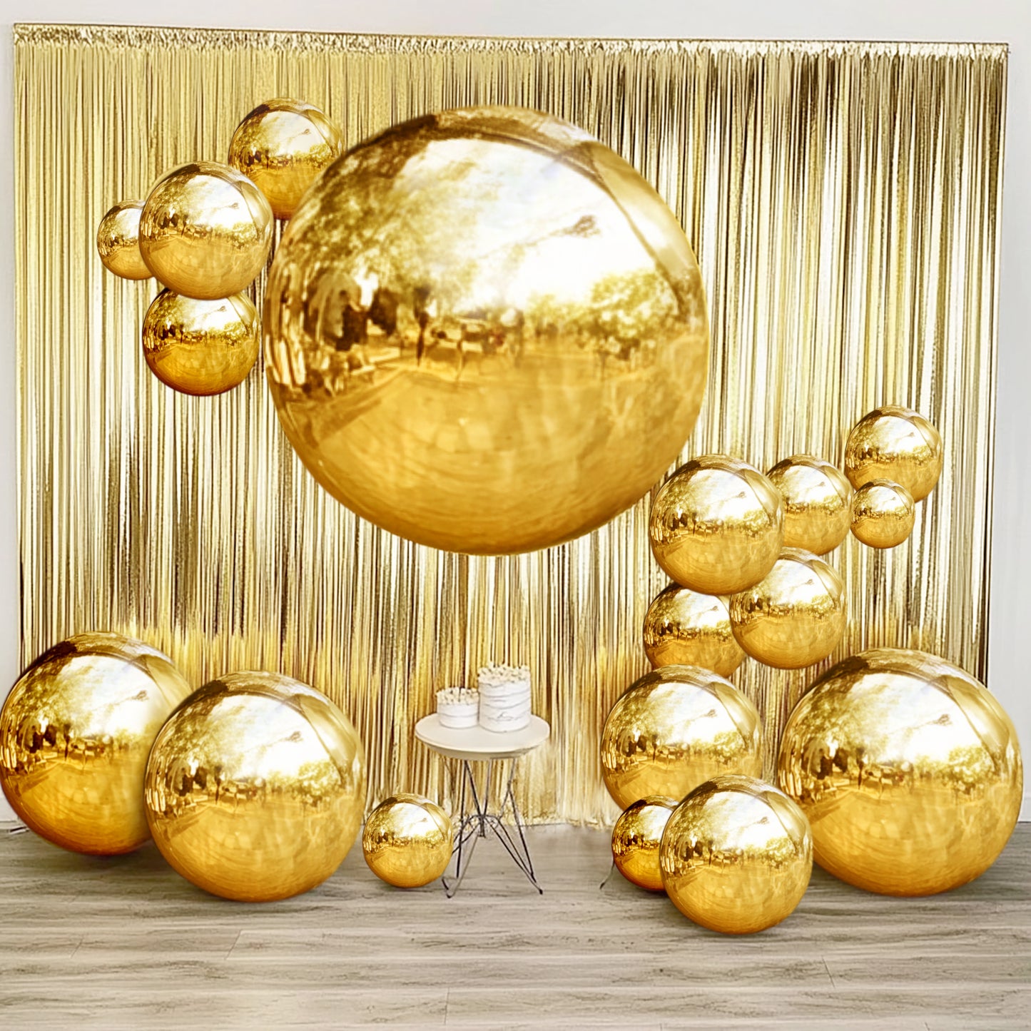 Metallic gold sphere balloons, 43" Mylar, for festive party decorations.