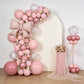 Matte blush decorative foil bow balloons for party backdrop and photo booth.