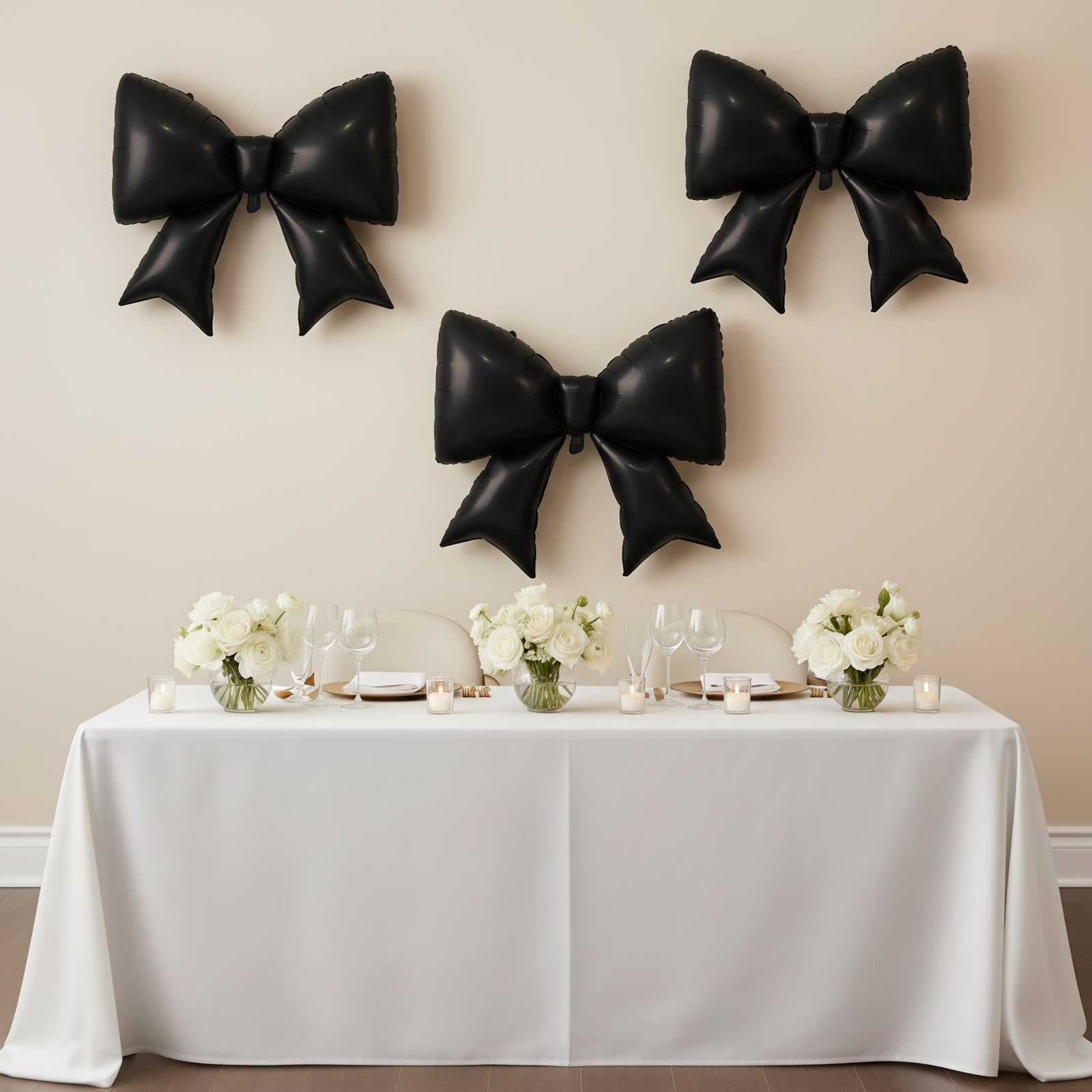 Matte black giant decorative foil bow balloons for event styling.