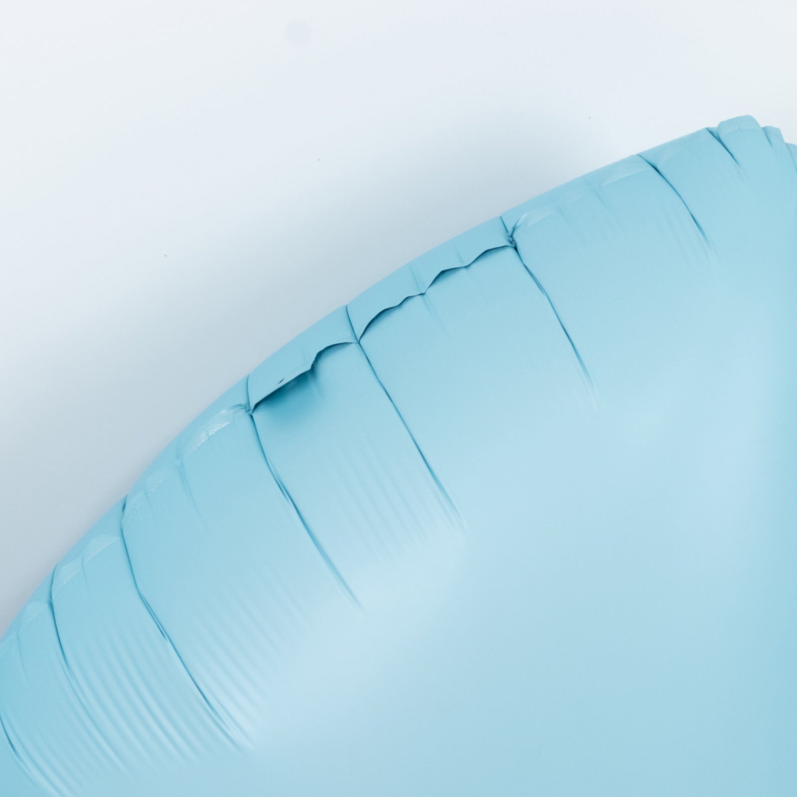 Matte light blue giant decorative foil bow balloon.