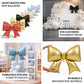 Matte red giant decorative foil bow balloons for party decor.