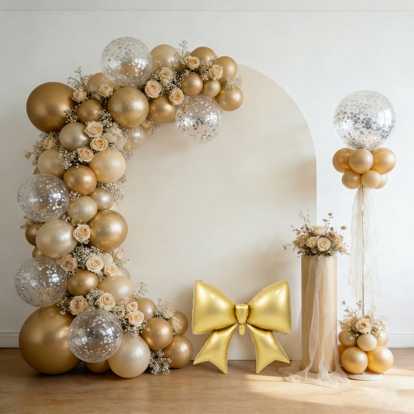 Matte gold giant foil bow balloons for party backdrop and event styling.