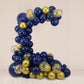 Royal blue and gold balloon arch decoration for parties.