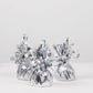 Metallic silver foil tassel top balloon weights, set of 12.