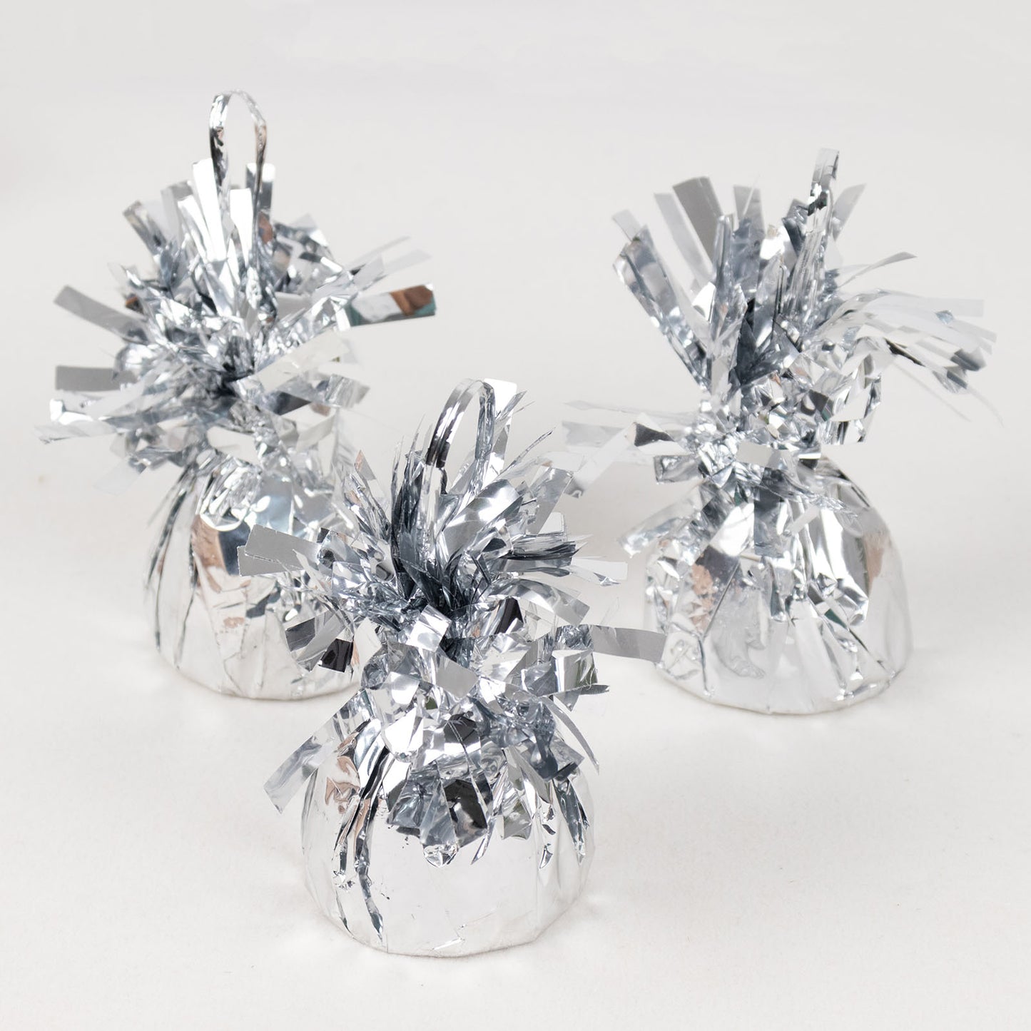 Metallic silver foil tassel top party balloon weights, 5-pack.