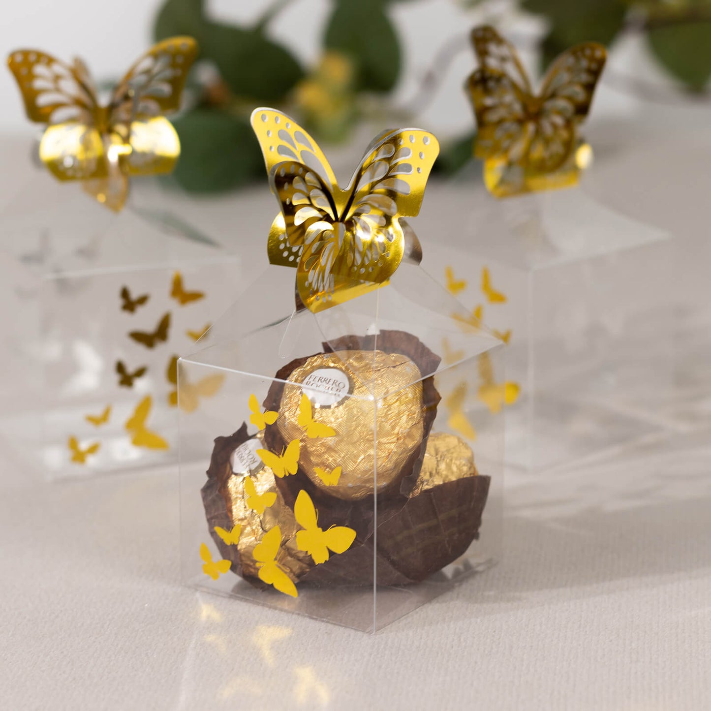 25 Pack Clear Transparent Square Party Favor Boxes with Gold Butterfly Top, Clear Candy Treat Gift Boxes - 2"x2"x4"