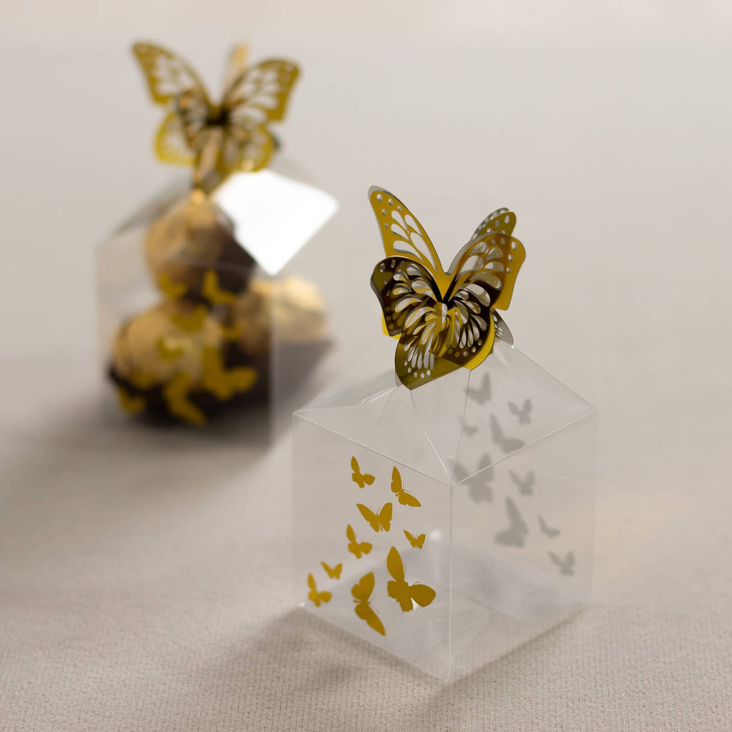 25 Pack Clear Transparent Square Party Favor Boxes with Gold Butterfly Top, Clear Candy Treat Gift Boxes - 2"x2"x4"