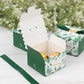 Green monstera leaf print candy gift boxes with satin ribbon bow.
