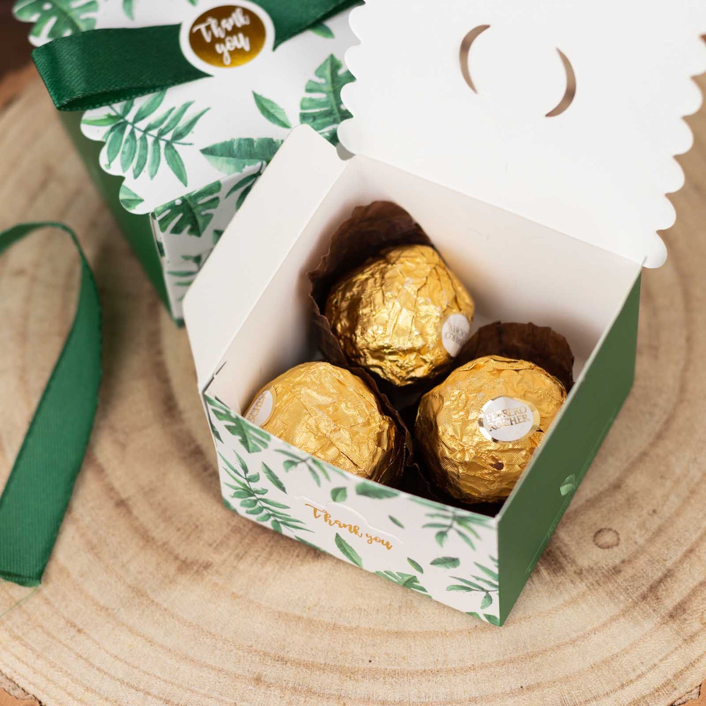 Green monstera leaf print candy gift box with satin ribbon and thank you card.