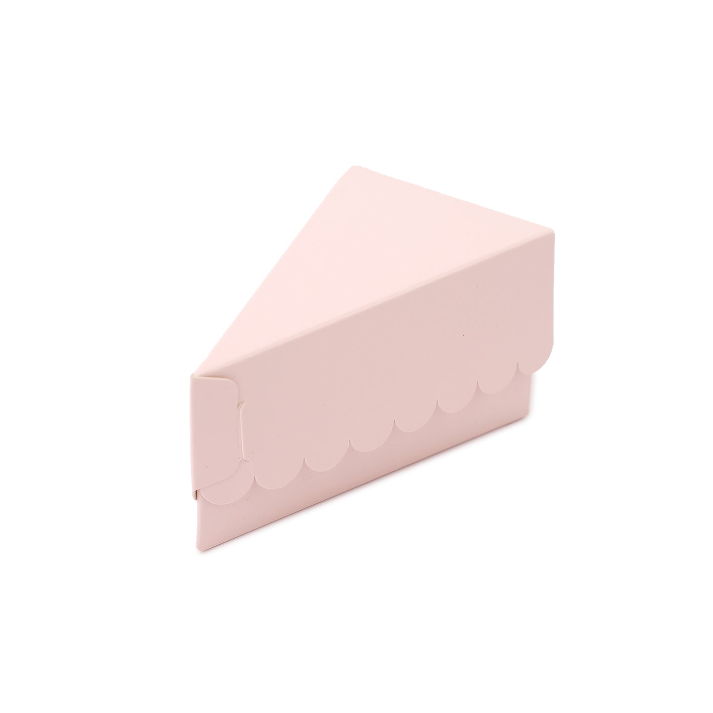 Blush triangular paper cake slice box with scalloped top.