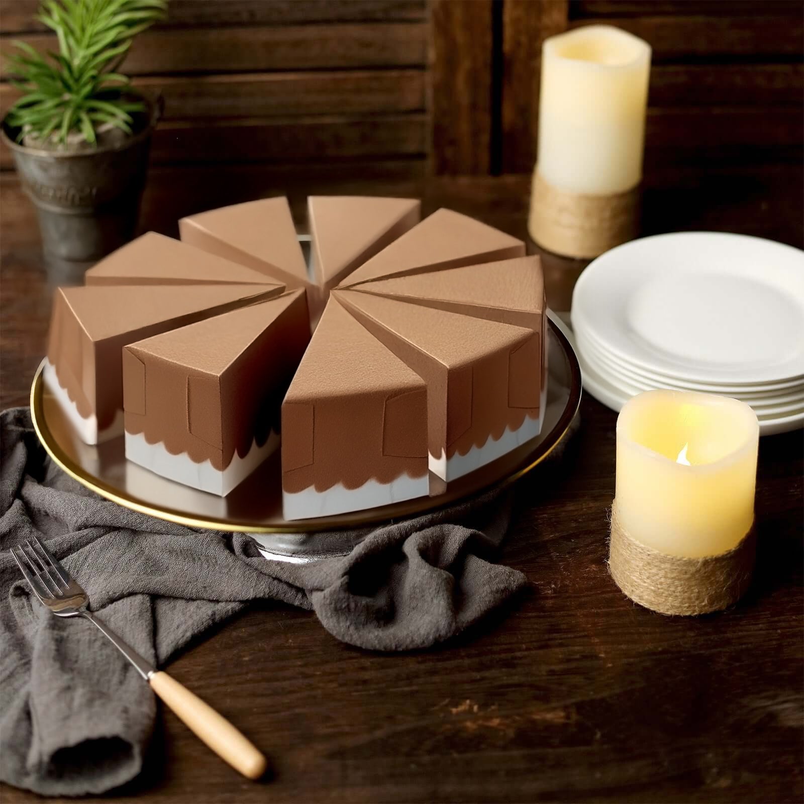 Natural brown paper cake boxes with white base, triangular shape, scalloped top.