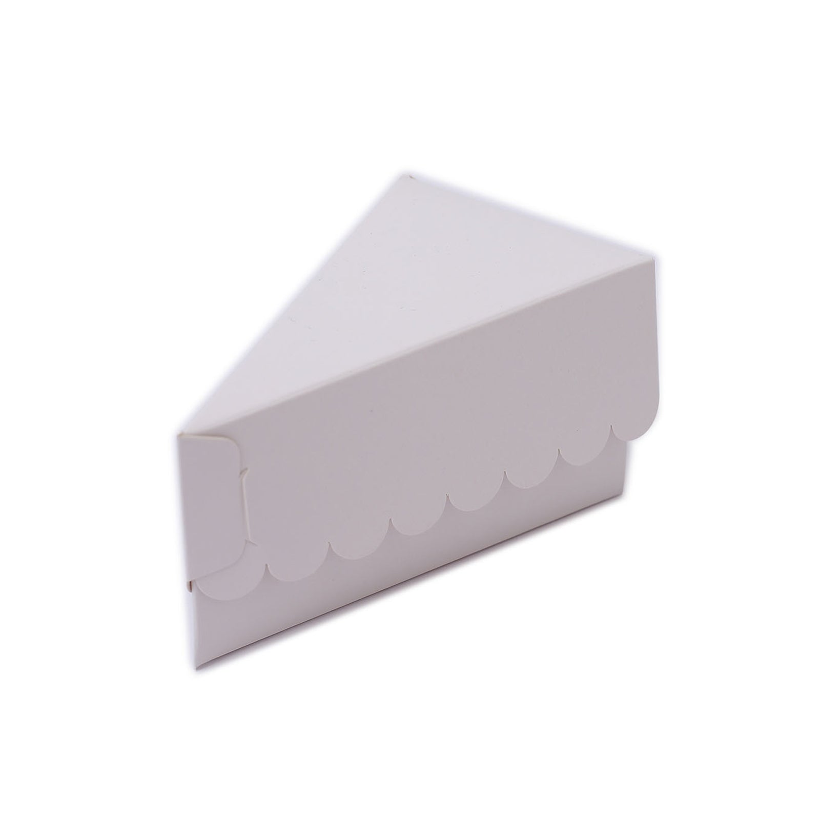 White triangular paper cake box with scalloped top.