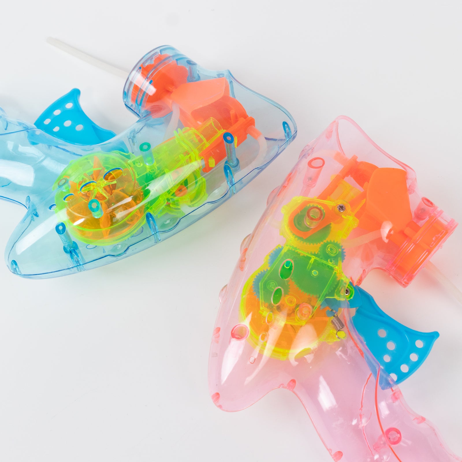 6-Pack LED bubble guns in bright blue and pink with refillable bottles.