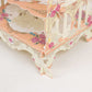 White peach floral print cardboard dessert display stand.