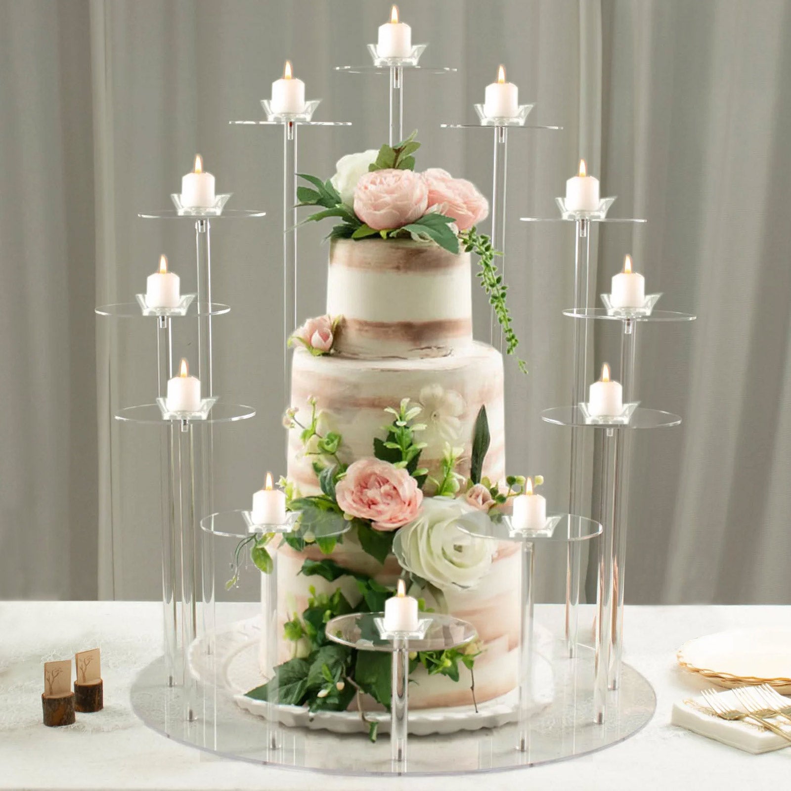 Clear acrylic dessert display stand with multi-layer round trays for cupcakes.