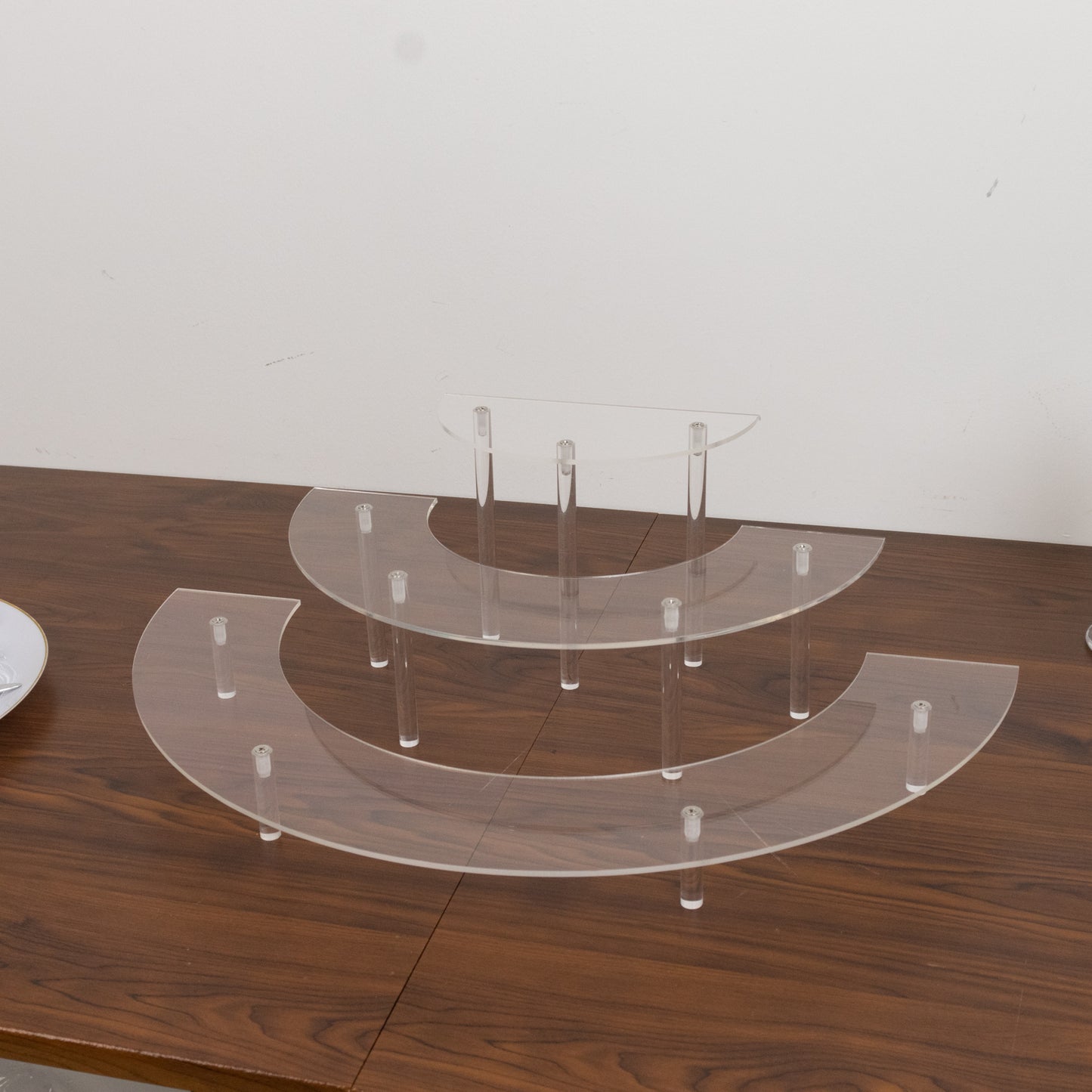 Clear acrylic half-moon display riser stands, 3-tier for cakes and collectibles.