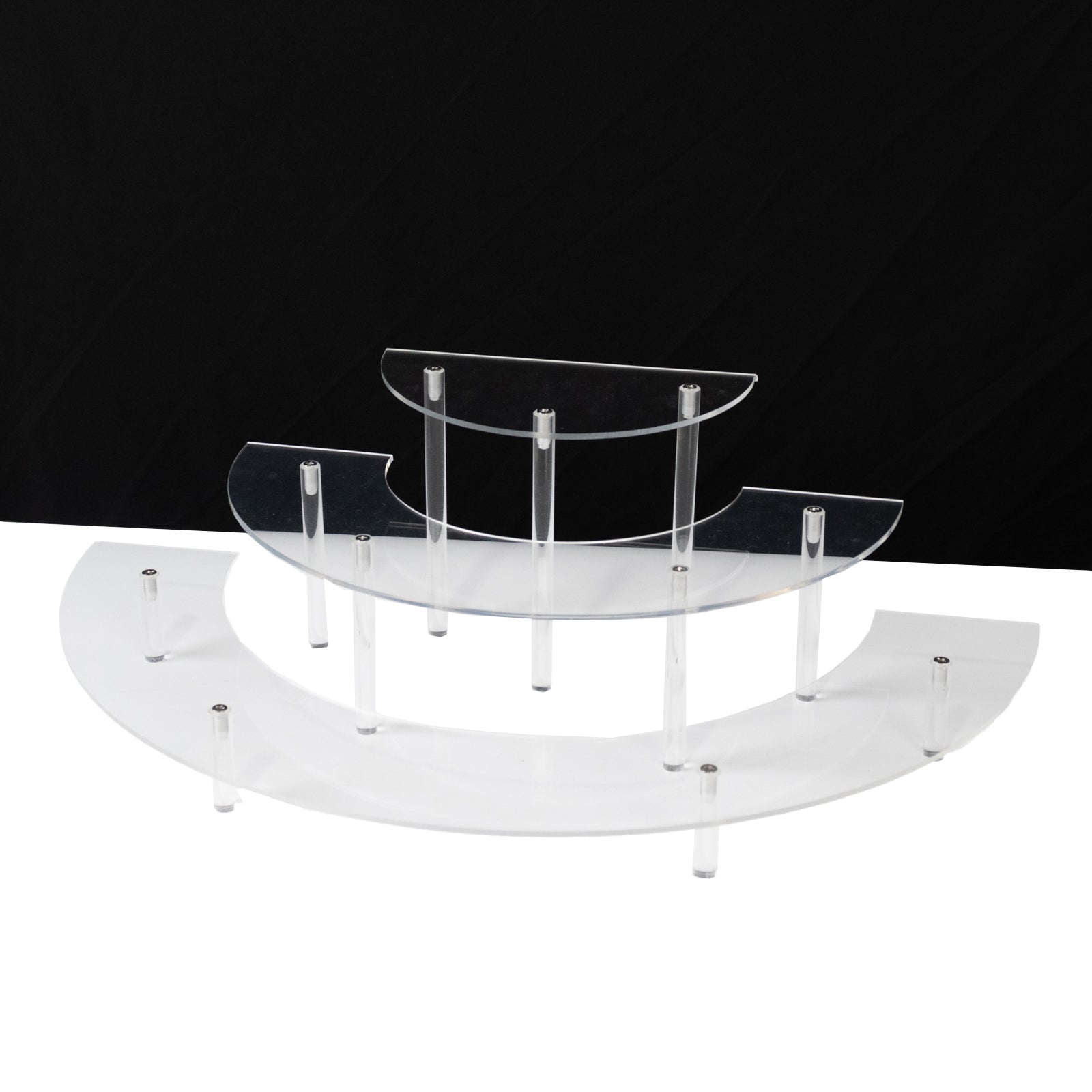 Clear acrylic half-moon display riser stands in three tiers for desserts and collectibles.