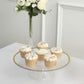 Clear plastic cupcake display riser with gold rim, showcasing six decorated cupcakes.