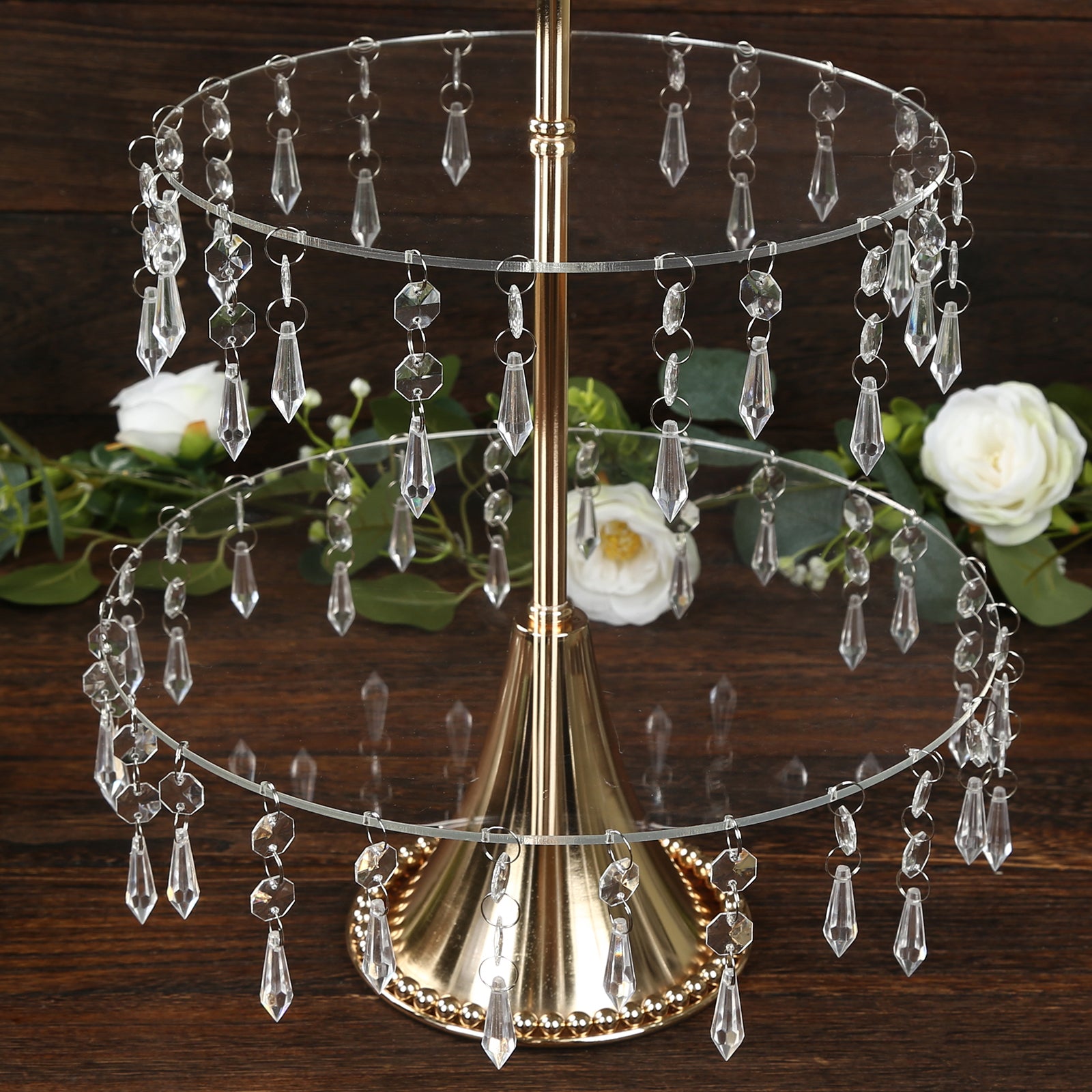 Gold 3-tier acrylic and metal cupcake stand with hanging crystals.