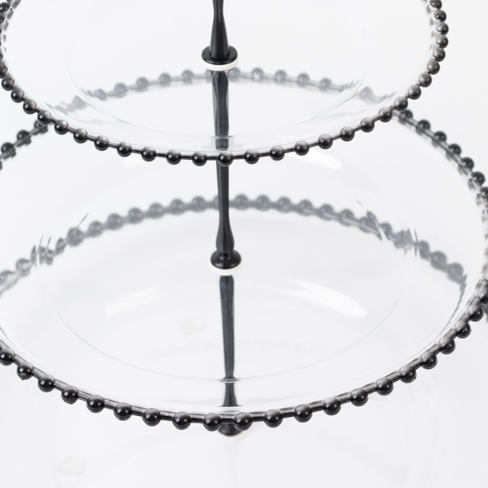 Clear 3-tier dessert display stand with black beaded rim.
