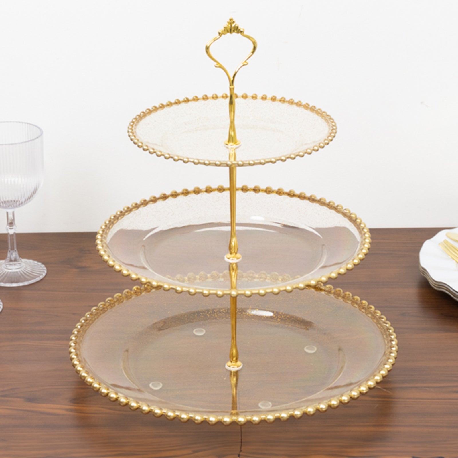 14" clear gold glittered 3-tier dessert display stand with beaded rim.